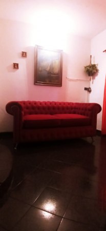 chesterfield cuero negro talampaya